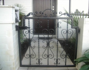 Wrought iron gate manufactured from hammered Rhs Steel