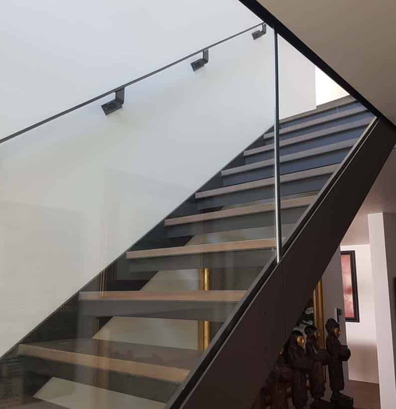 steel stair stringers and flat bar handrail